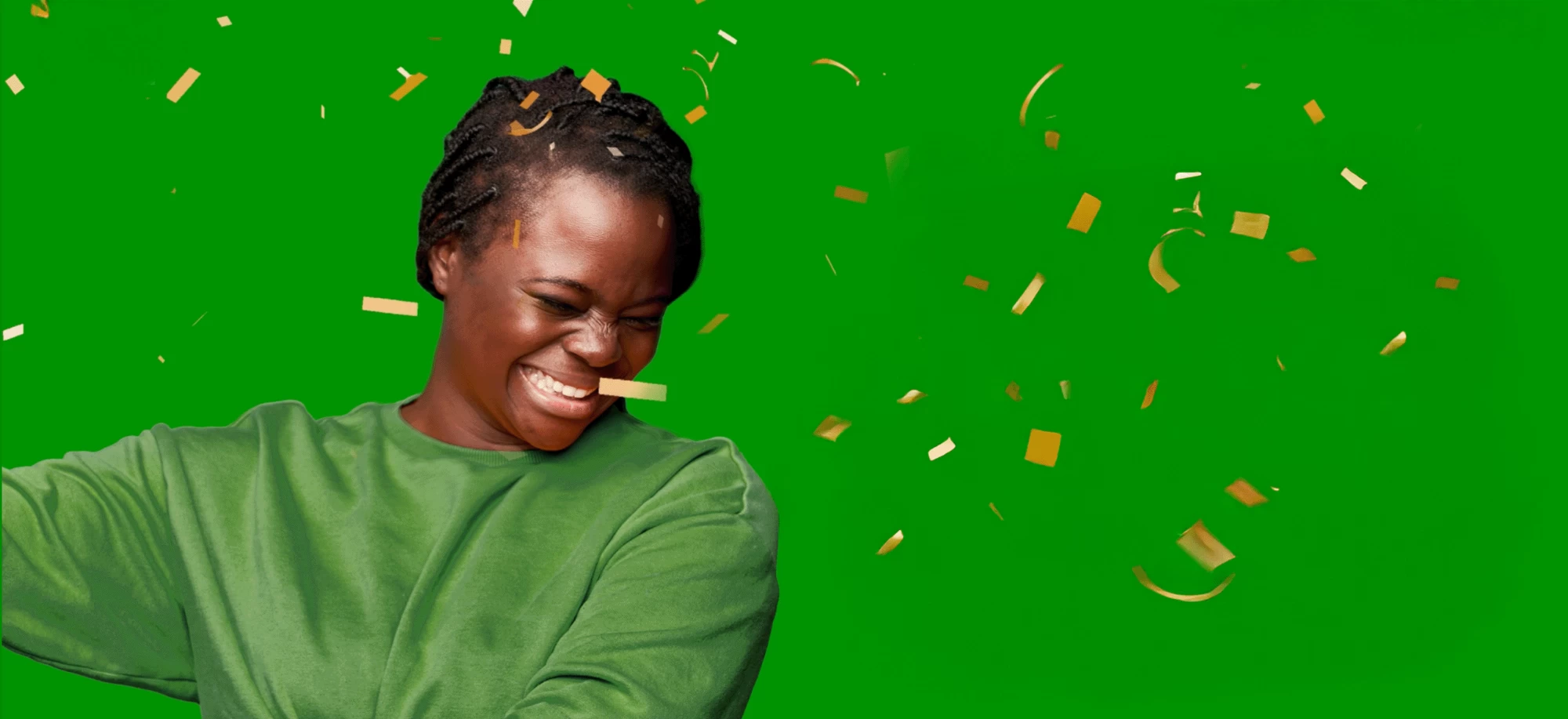 Image of a happy woman under falling confetti